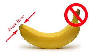 pinch the short tip of the banana